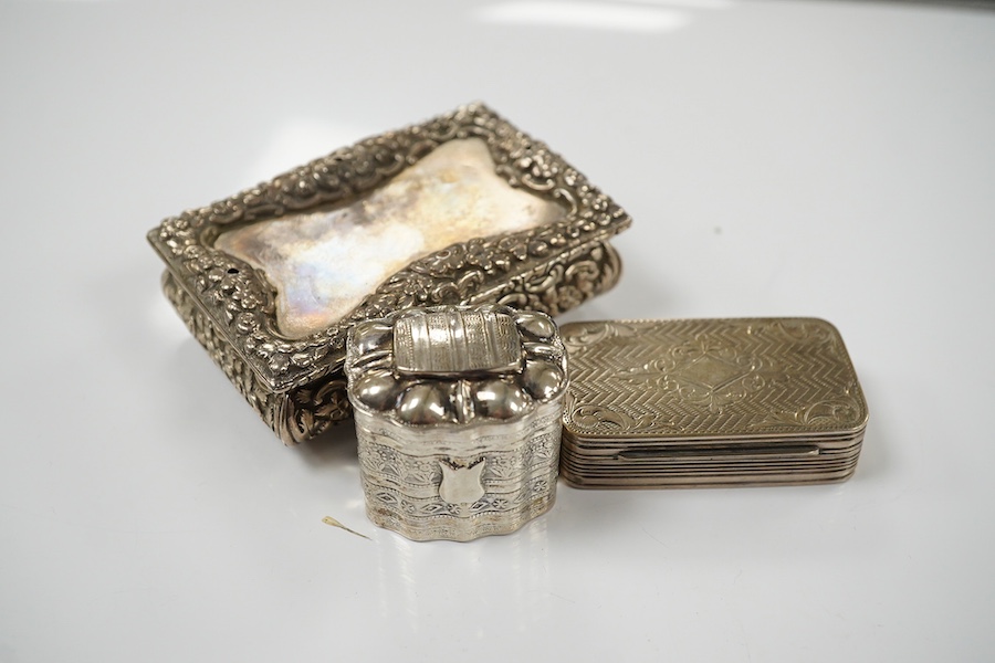 A George IV silver snuff box, by Nathaniel Mills (a.f.), Birmingham, 1827, 84mm, a Dutch white metal pill box and a Portuguese white metal snuff box. Condition - poor to fair